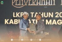 Pj Bupati Magetan Menerima Penghargaan Opini WTP BPK Perwakilan Jawa Timur. ( Prokopim/Ist).