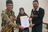 Nanik Sumantri dibersamai Ketua DPD Partai Golkar Magetan Zakaria dan Sekretaris Muhyar. ( Jatimnesia/ist)