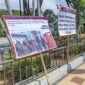 Banner Terpasang di Pagar Alun -Alun Magetan.