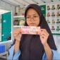 Pemilik Warung Tunjukan Uang Pecahan 100 ribu diduga Upal.