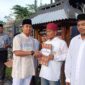 Karutan Magetan Ari Rahmanto menyerahkan dokumen remisi kepada warga Binaan.