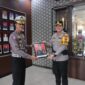 Kapolres Magetan AKBP Raden Erik Bangun Prakasa bersama AKBP Satria Permana.  