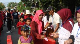 Pengumpulan Kupon Peserta Jalan Santai Warga Desa Gulun Maospati.