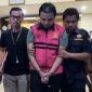 Daniel Sakti Kusuma Wijaya alias Lete saat dijebloskan penjara oleh Penyidik Kejaksaan Negeri Ponorogo.